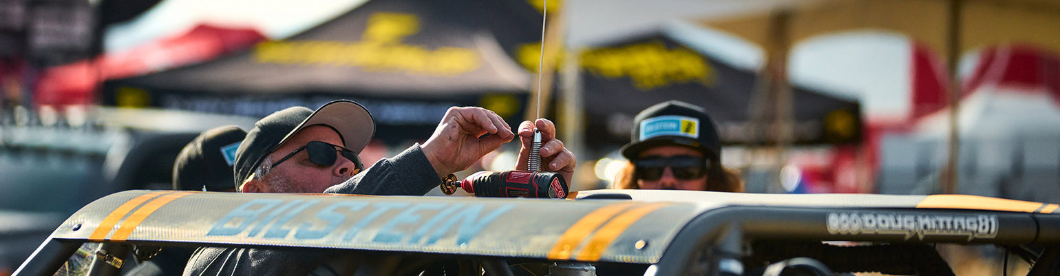 Antenna accessories—including BNC connector kits, spring bases, ground plane discs, ground straps, and Allen wrenches for antenna installation and repair.