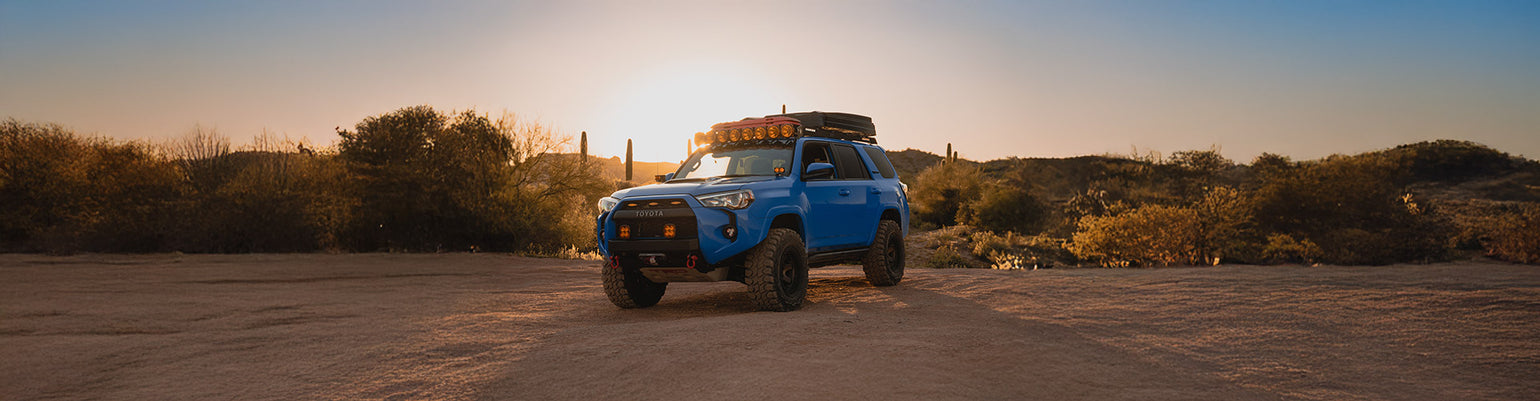 Rugged Radios Toyota and Lexus two‑way GMRS mobile radio kits with direct‑fit radio mount and A‑pillar antenna bracket for Tacoma, Tundra, 4Runner, Sequoia, and GX470—easy bolt‑in installation for overland communication.